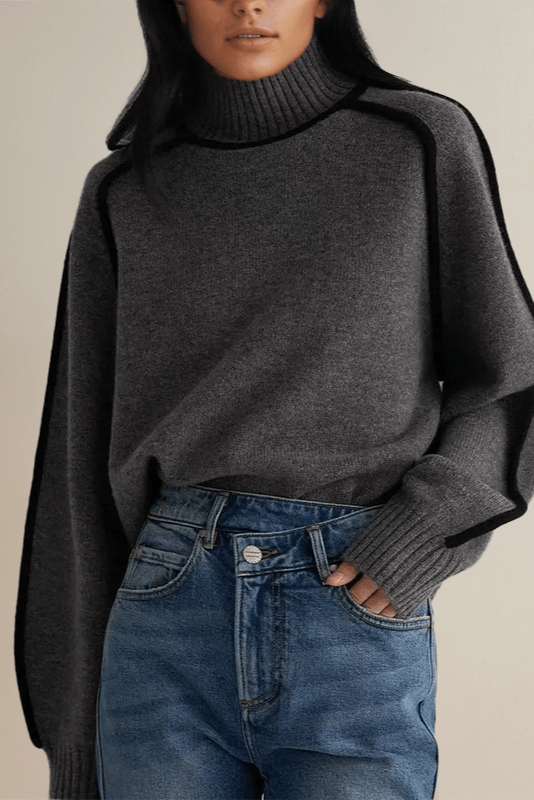 Obrýsovaný vysoký límec svetr