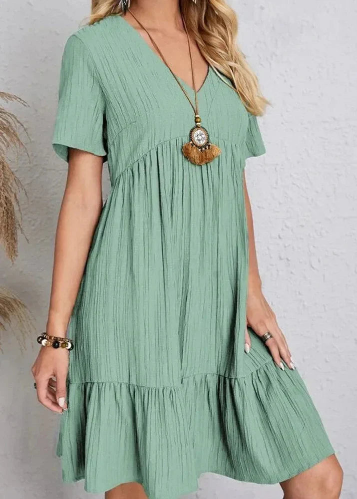 Volná lněná šaty s volánem